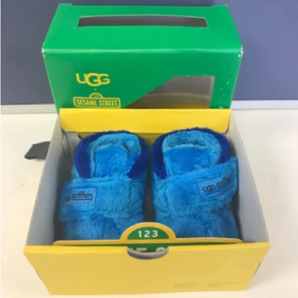 UGG Sesame Street Kids Blue Slippers - Picture 1 of 8
